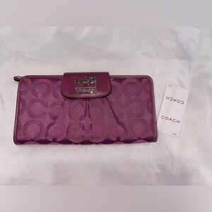 NWOT Coach RARE Ashley OP Art C Purple wallet. Measures 7.5x4. Has spot on back.